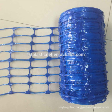 blue plastic snow fence underground warning mesh